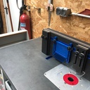 Aspiration déportée défonceuse sous table