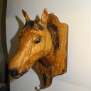 Tete cheval sur platine murale  scultée