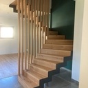 Escalier avec jour central à claire-voie