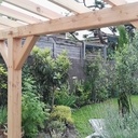 Pergola avec enture droite crantée abouts en coupe et clefs.