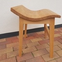 Tabouret à l'assise galbée