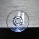 Galet de guidage dans les rainures : Rondelle de plexi et roulement à bille