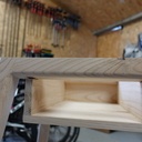 Bureau en arêtier avec tiroir suspendu