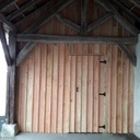 Bardage en Douglas brute sous le préau de l'école