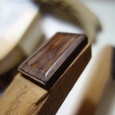 Le brunissoir en touche de guitare