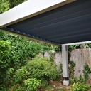 Pergola bioclimatique ossature bois.