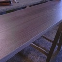 Fabrication d'un lit a tiroirs en mélaminé chêne brun .