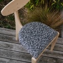 Chaise à trois pieds