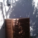 Enjoliveur de compresseur de clim et porte coulissante pool house