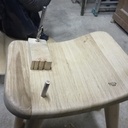 Petit tabouret assise courbe