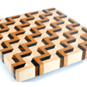 Un nouveau niveau dans la planche à découper en bois de bout