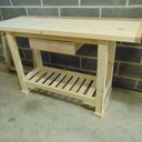 dessus en lamellé collé epaisseur 45mm. Pour le reste idem au précédent