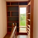 Bibliothèque d’angle en hêtre massif