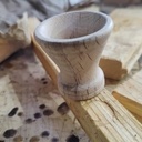 Manche en bois d'un couteau et coquetier