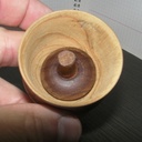 On peut ranger la toupie dans le verre !