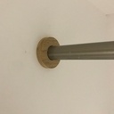 Fixation barre porte manteau