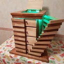 Meuble transformable à deux ailes