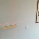 Repérage au laser du dessous de l'étagère centrale