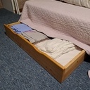 Tiroirs de rangement sous les lits