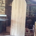 Porte intérieur deux battants  sous arche en pierres