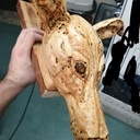 Sculpture d'une tête de galgo