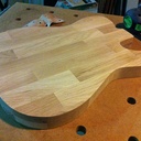 Planche à découper en forme de guitare électrique