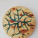 Horloge en pin et resine