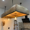 Toit d'îlot en chêne et châtaignier, touches de métal.