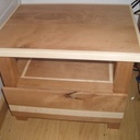 Un lit et ses tables de chevets