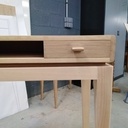 Console piètement gainée