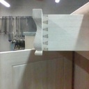 assemblage du tiroir à queues d'aronde réalisées à la main. façade rapportée avec reprise de moulure à la main