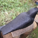 Oiseau sculpté dans une chute de tasseau