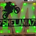 M comme Mélania et Moto-cross...