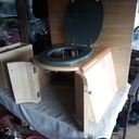 Porte ouverte, pour enlever/remettre le seau