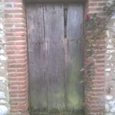 Porte a tas de sable à étanchéité renforcée