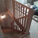 Escalier un quart tournant en chêne sans contremarches