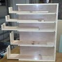 Un meuble de rangement pour fraises et mèches