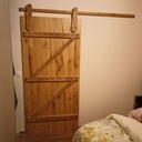 Porte coulissante avec roue de roller