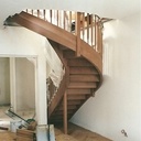 Escalier lamellé colle en fer à cheval