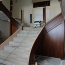 Habillage escalier beton depart courbe et à double révolution