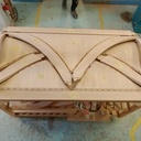 Cache tuyaux cintré