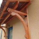 Marquise sur facade isolée par l'exterieur et enduite.