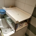 Table à langer sur baignoire