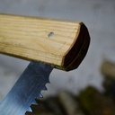 Cadre de scie à bûches sorti d'une bûche, sans machine