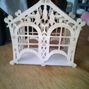 Maison cache capsule de café