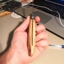 Opinel avec manche en olivier et dragonne