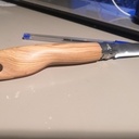 Opinel avec manche en olivier et dragonne