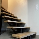 Escalier quart tournant double limon central