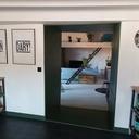 Bibliothèque, séparation cuisine/salon