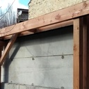 Ensemble porteur d'une terrasse avec bardages.